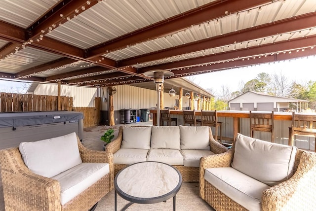 80 Serenity Ct, Gepp, AR 72538 - view of patio featuring fence, a hot tub, and an outdoor hangout area