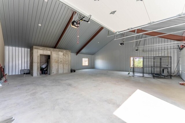 80 Serenity Ct, Gepp, AR 72538 - garage featuring metal wall and a garage door opener