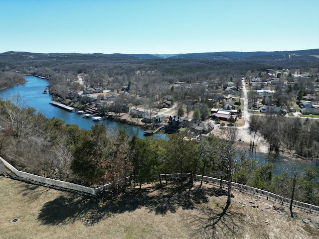 bird's eye view with a water and mountain view