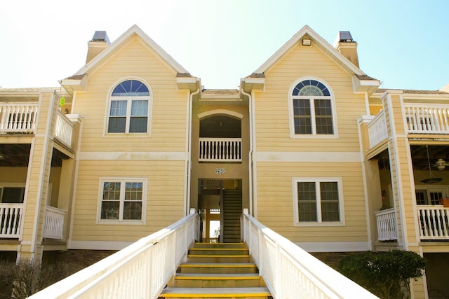 view of front of property with a chimney