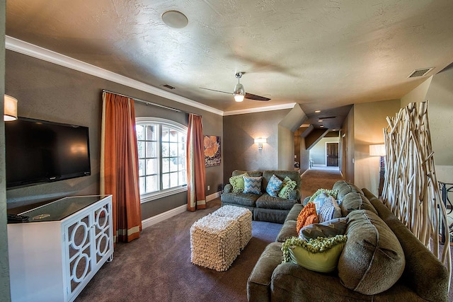 living area with a textured ceiling, ceiling fan, carpet floors, visible vents, and crown molding