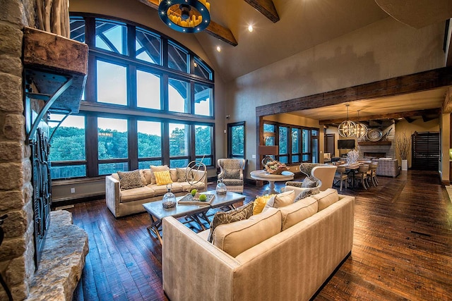 living area with high vaulted ceiling, a notable chandelier, a fireplace, beam ceiling, and wood-type flooring