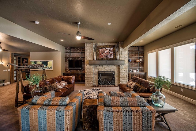 carpeted living area with baseboards, visible vents, a stone fireplace, and a textured ceiling