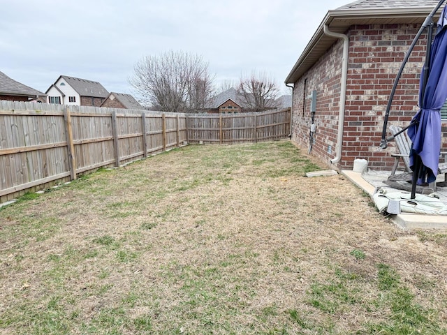 view of yard featuring a fenced backyard