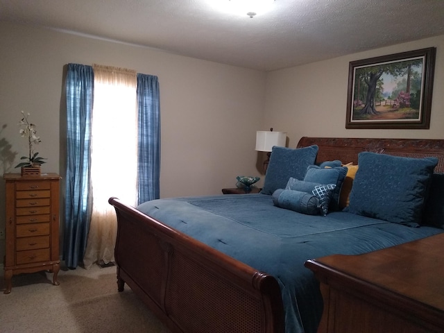 bedroom with light colored carpet
