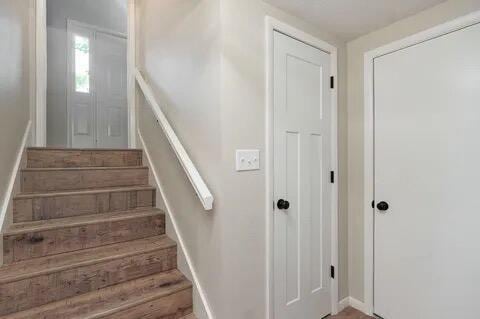 staircase with baseboards