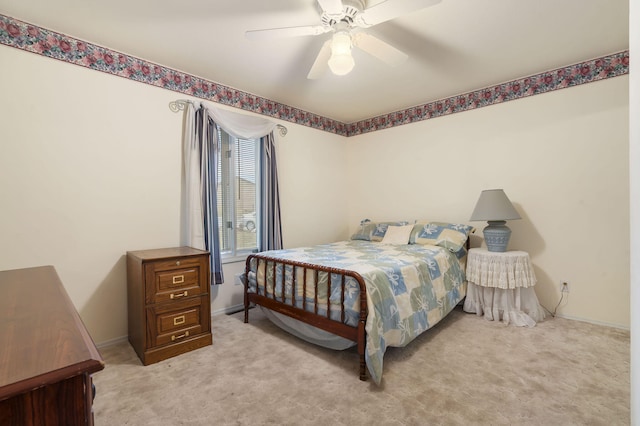 bedroom featuring carpet floors, ceiling fan, and baseboards