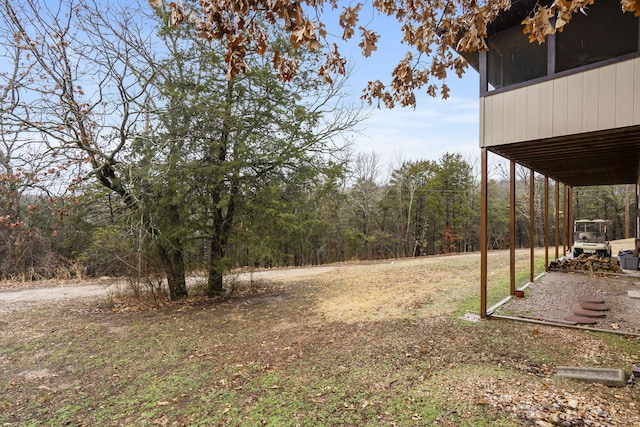 view of yard featuring a sunroom