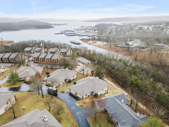 bird's eye view featuring a residential view and a water view