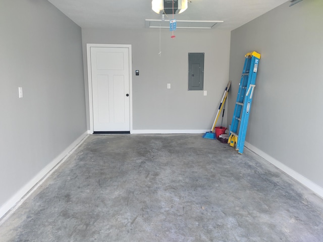 garage with electric panel, baseboards, and a garage door opener