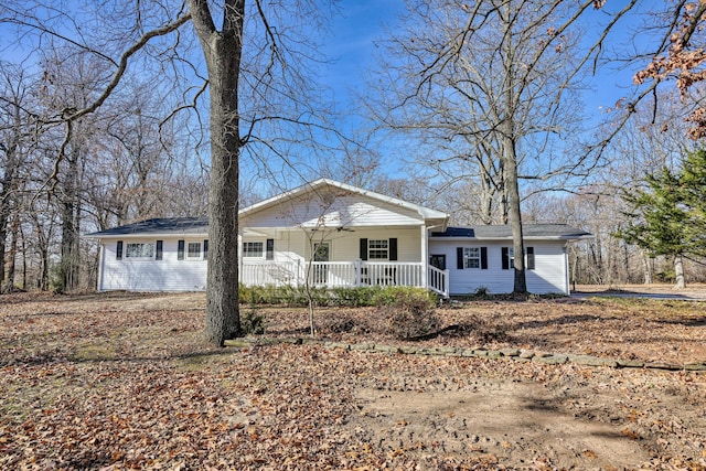 ranch-style house featuring a porch