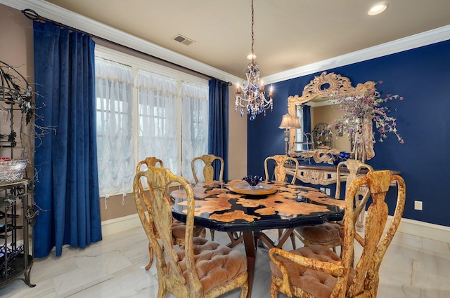 dining room featuring ornamental molding, visible vents, a notable chandelier, and baseboards