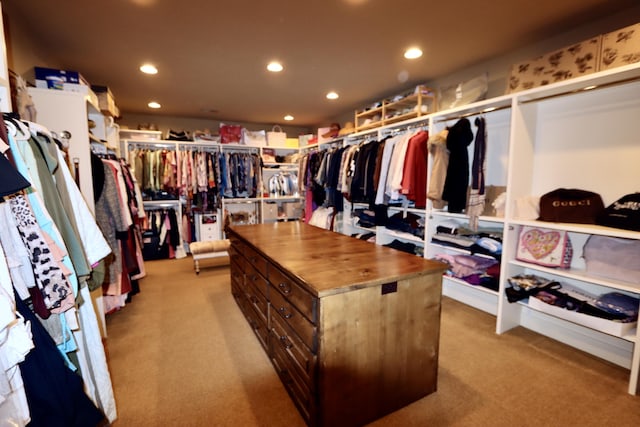 spacious closet featuring carpet floors