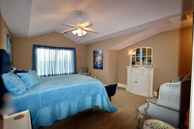 bedroom featuring carpet flooring, visible vents, baseboards, vaulted ceiling, and a ceiling fan