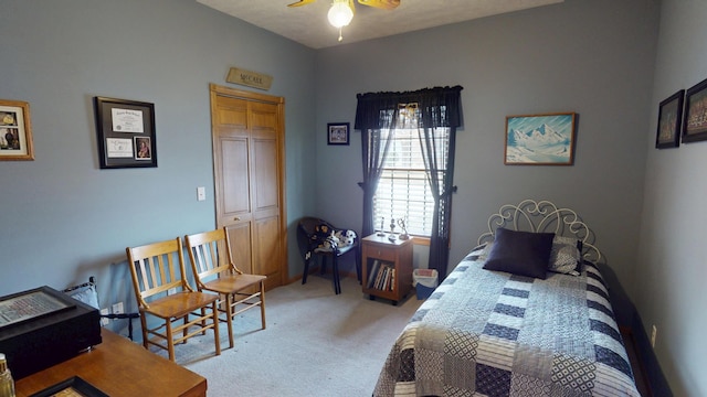 bedroom with light carpet