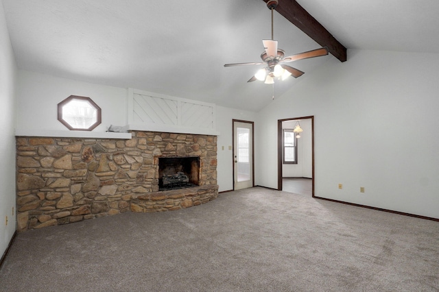 unfurnished living room featuring baseboards, a ceiling fan, beamed ceiling, carpet, and a fireplace