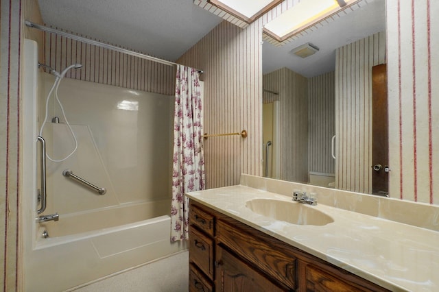 full bathroom featuring vanity and shower / tub combo with curtain