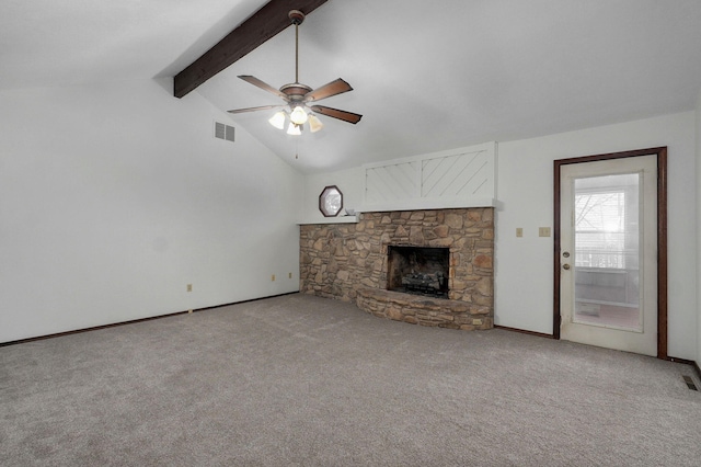 unfurnished living room featuring carpet floors, beam ceiling, visible vents, a ceiling fan, and a stone fireplace