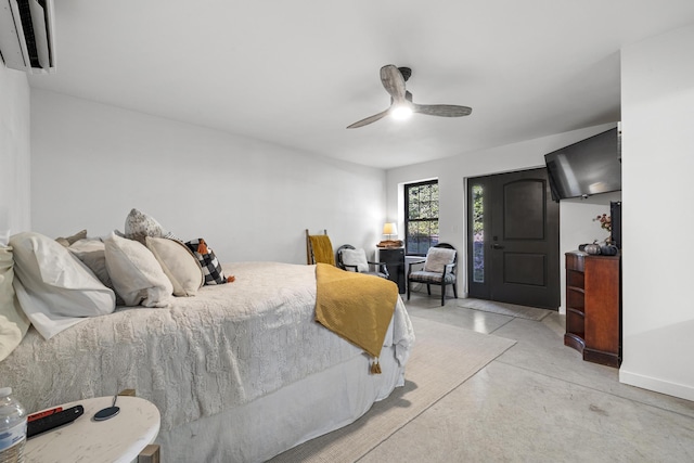 bedroom with concrete flooring, access to outside, an AC wall unit, and ceiling fan