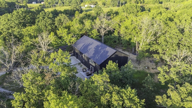 aerial view featuring a view of trees