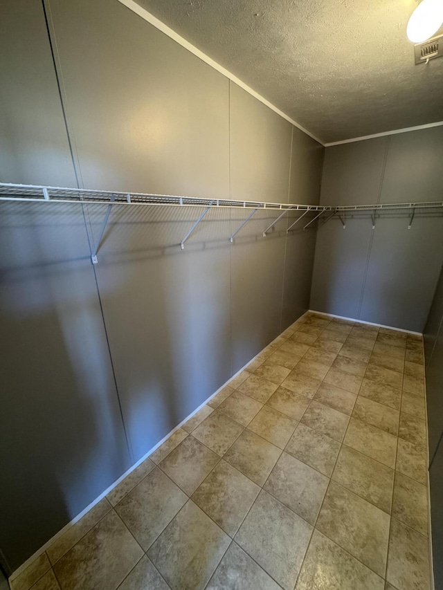 walk in closet featuring visible vents