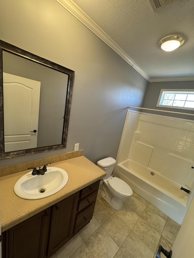 full bath with toilet, ornamental molding, tile patterned floors, a textured ceiling, and vanity