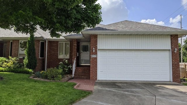 ranch-style home featuring driveway, brick siding, an attached garage, and a shingled roof