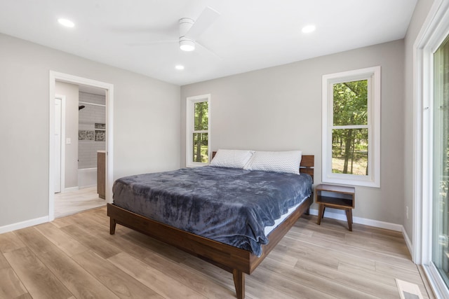 9 View Table Rock Lndg Unit 12, Branson West, MO 65737 - bedroom featuring multiple windows, light wood finished floors, recessed lighting, and a ceiling fan