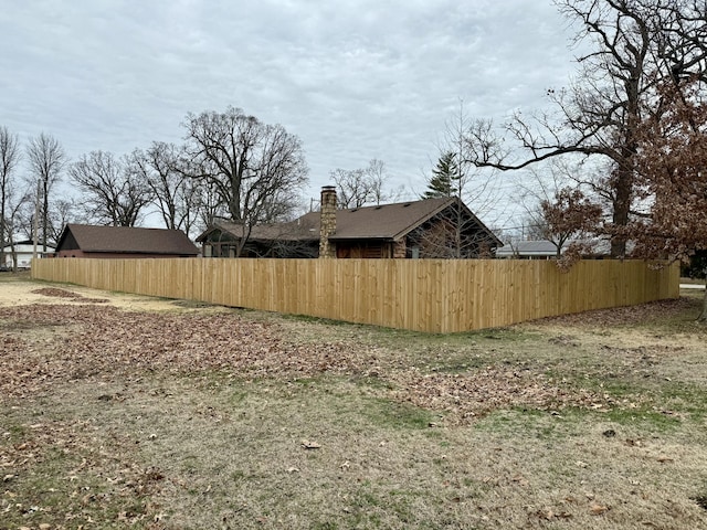 view of yard featuring fence