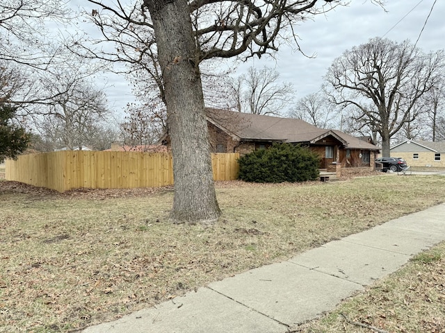 exterior space featuring fence