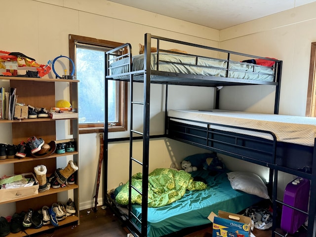 bedroom with wood finished floors