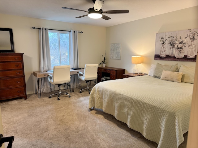 carpeted bedroom with a ceiling fan