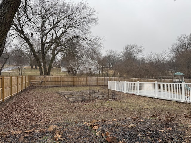 view of yard with a fenced backyard