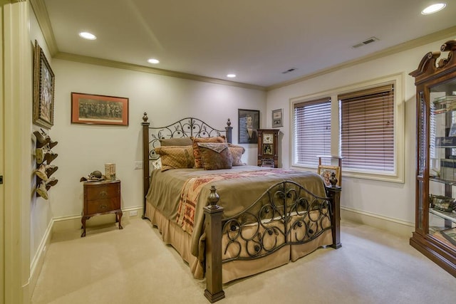 bedroom with recessed lighting, light colored carpet, visible vents, baseboards, and crown molding