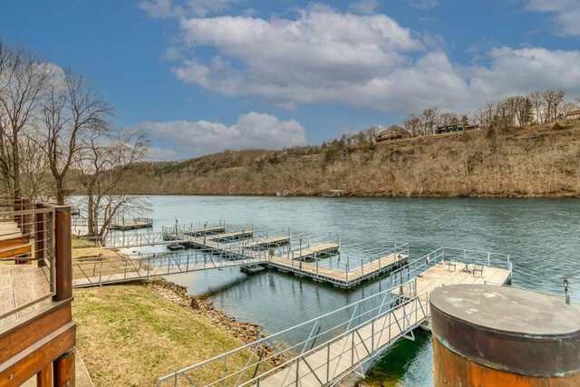 view of dock with a water view