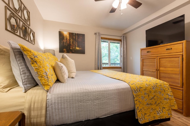 bedroom with ceiling fan and wood finished floors