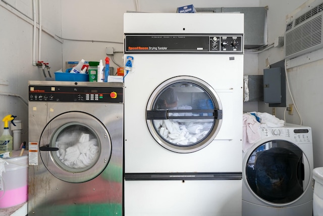 laundry room featuring washing machine and dryer