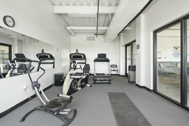 workout area featuring visible vents and baseboards