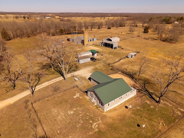 birds eye view of property featuring a rural view