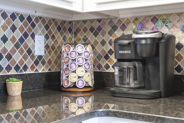 kitchen featuring dark countertops and decorative backsplash