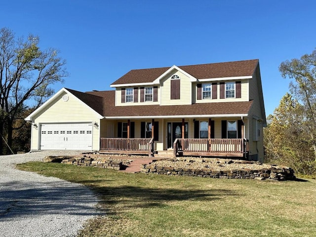 view of front of house featuring driveway, a shingled roof, an attached garage, a porch, and a front yard