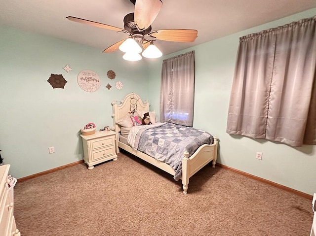 bedroom featuring carpet floors, ceiling fan, and baseboards