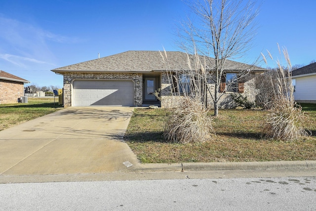 ranch-style house featuring a shingled roof, brick siding, driveway, and an attached garage