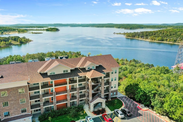 drone / aerial view featuring a water view