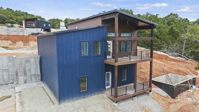 view of outbuilding with fence