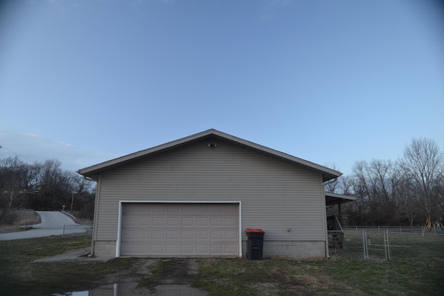 garage featuring fence