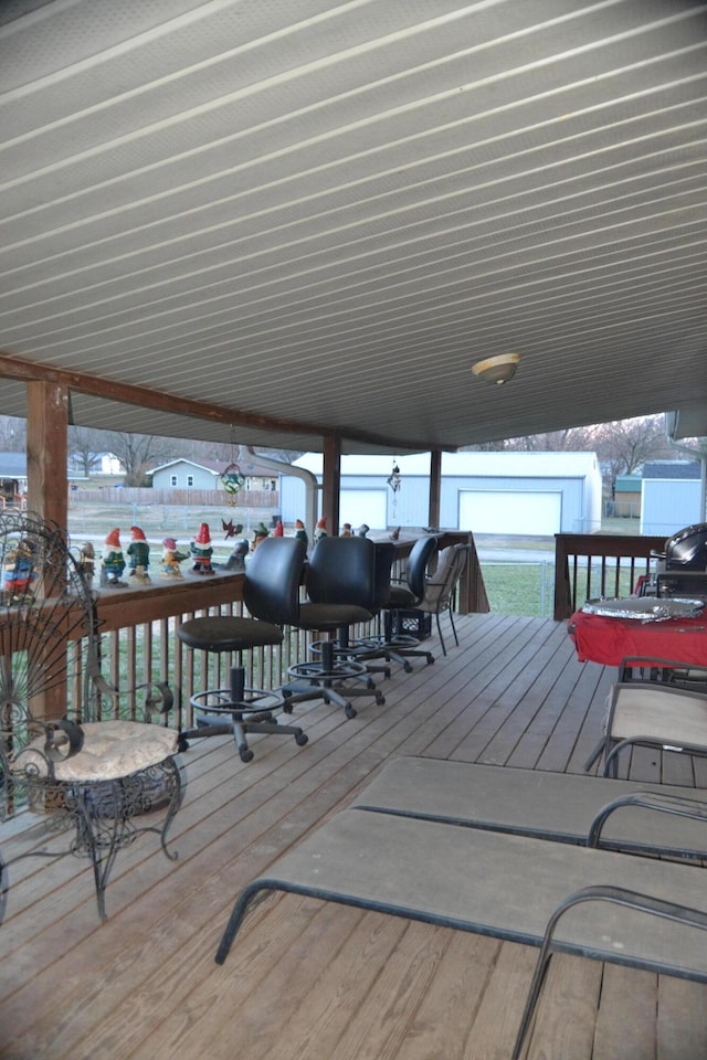 wooden deck featuring fence