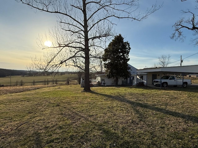 view of yard with a carport