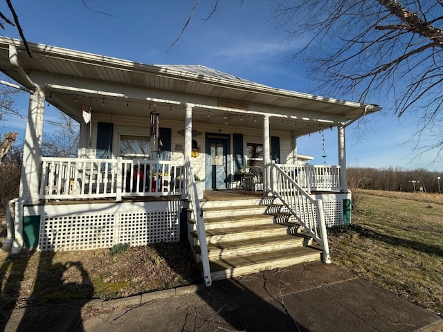 view of front of home featuring covered porch