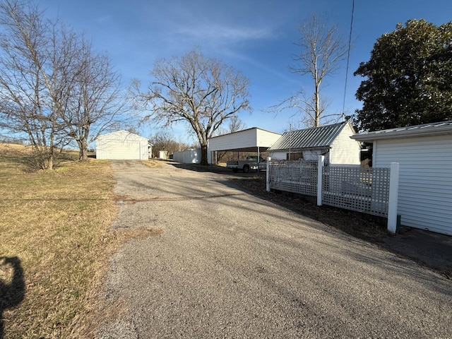 view of road with driveway